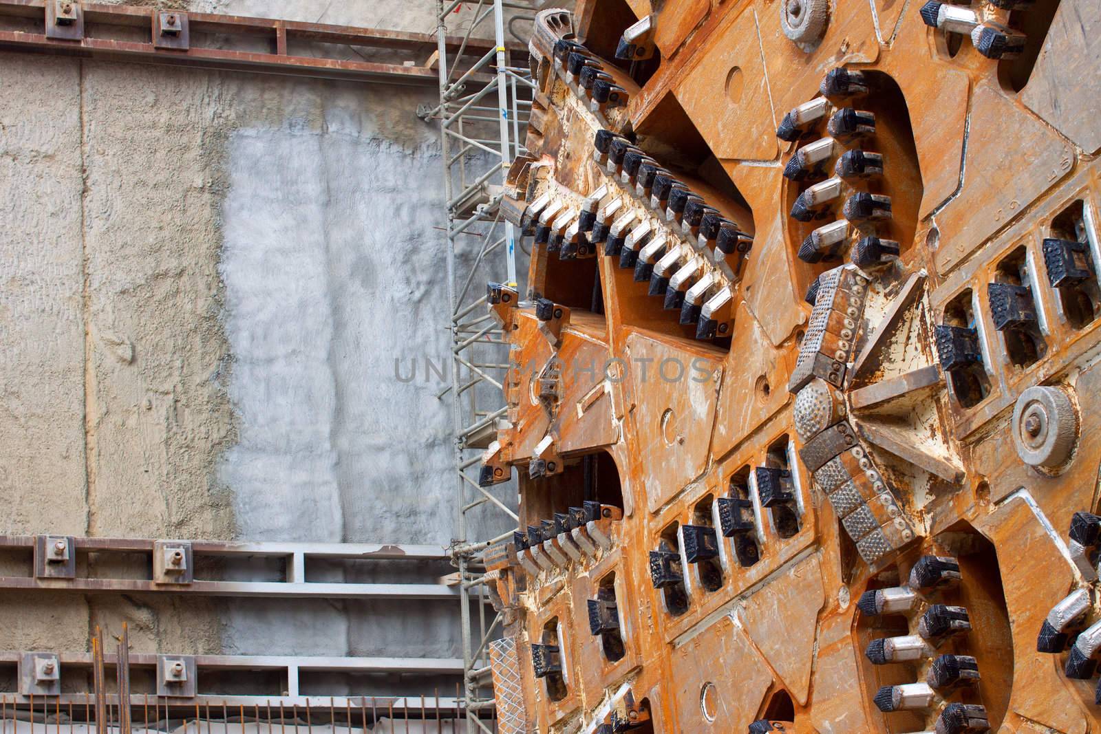 Close-up of tunnel boring machine cutter head constructing metro