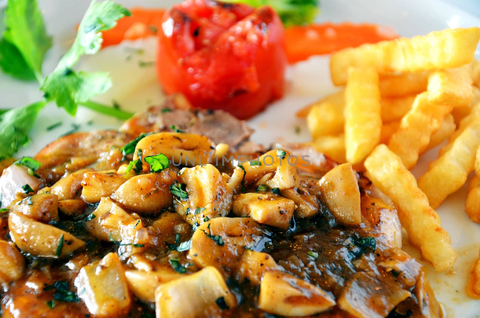 Delicious beef steak with mushrooms 