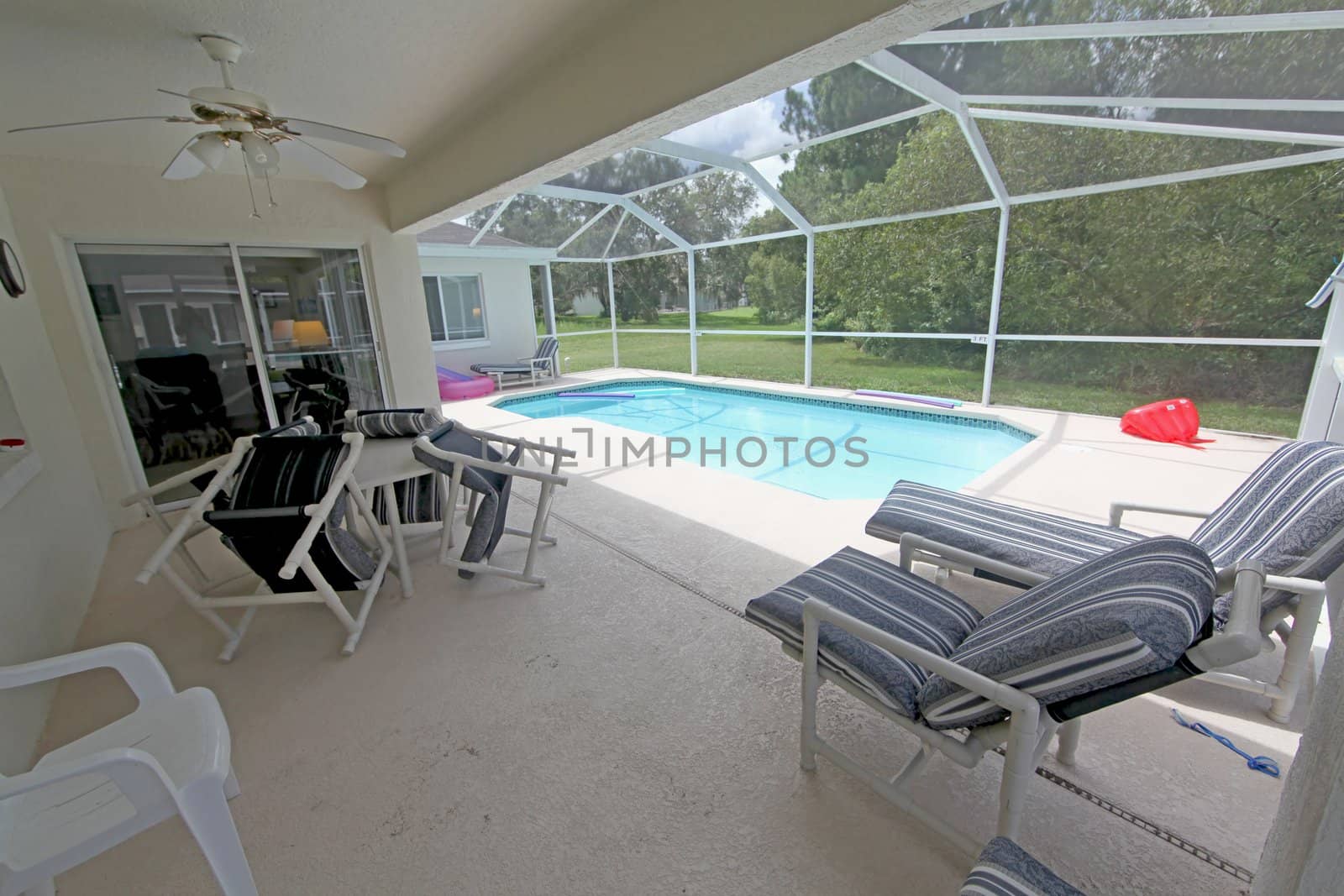 A Swimming Pool and Lanai overlooking Conservation