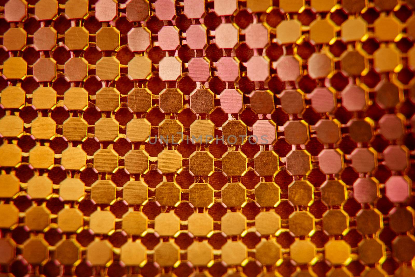 Orange sequins abstract close up background.