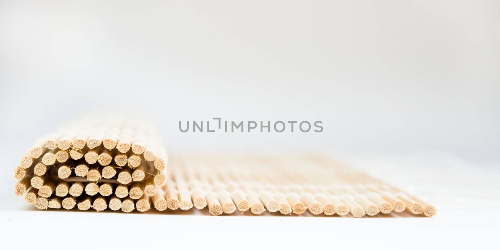 a small bamboo rug for cooking sushi