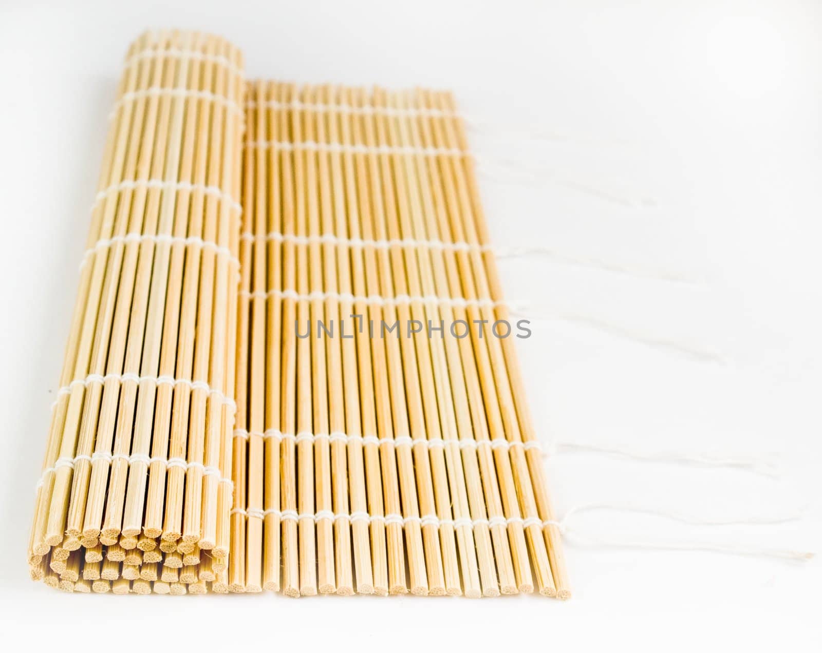 a small bamboo rug for cooking sushi