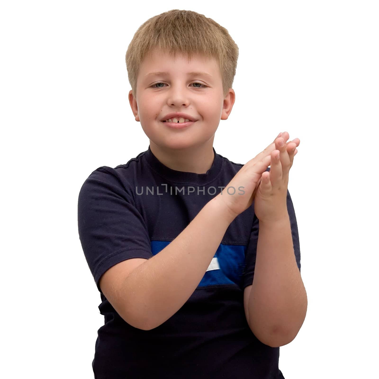 smiling boy applauds on a white background