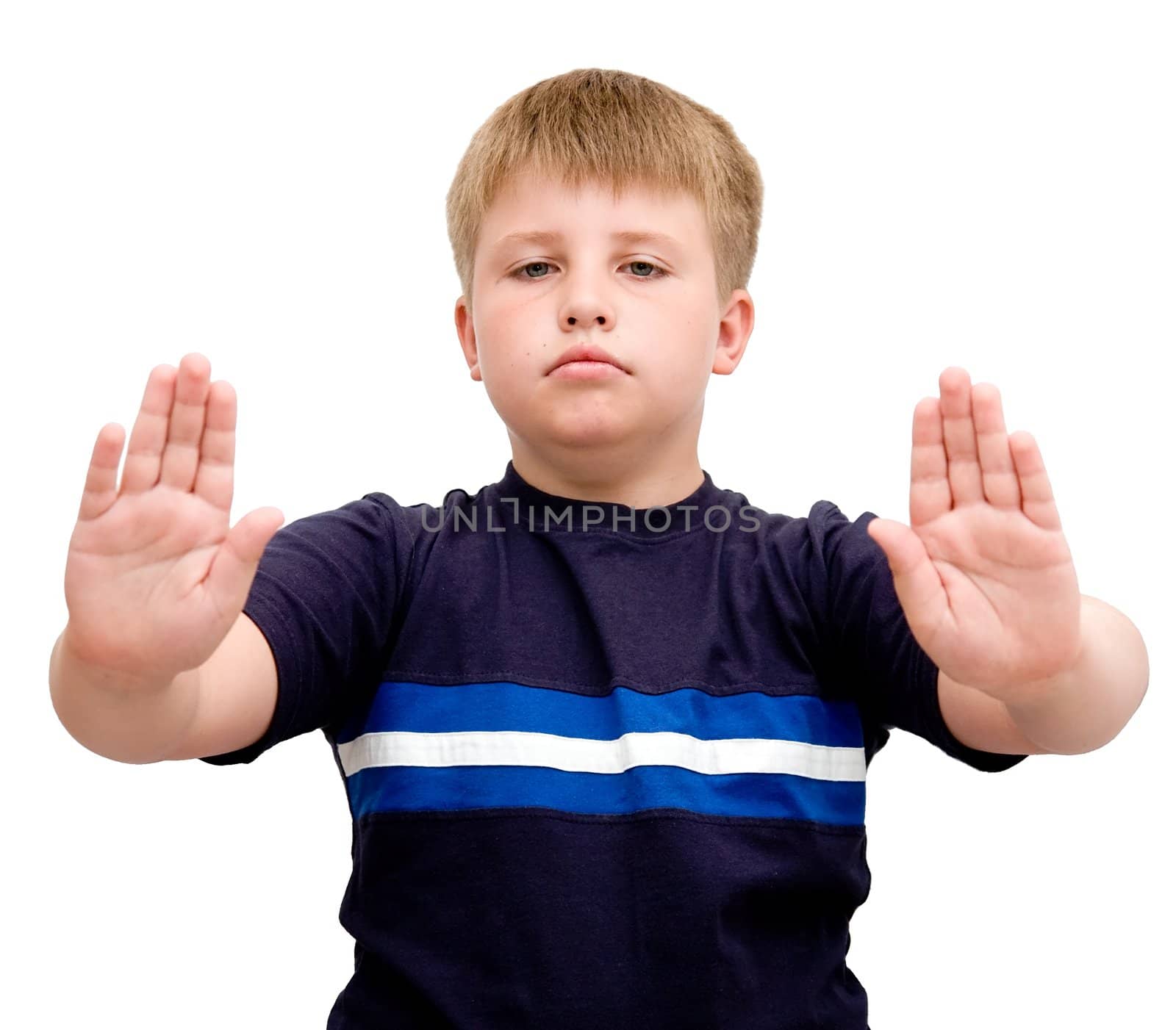 Image of young boy with hand outstretched, warding off any unwelcome situations