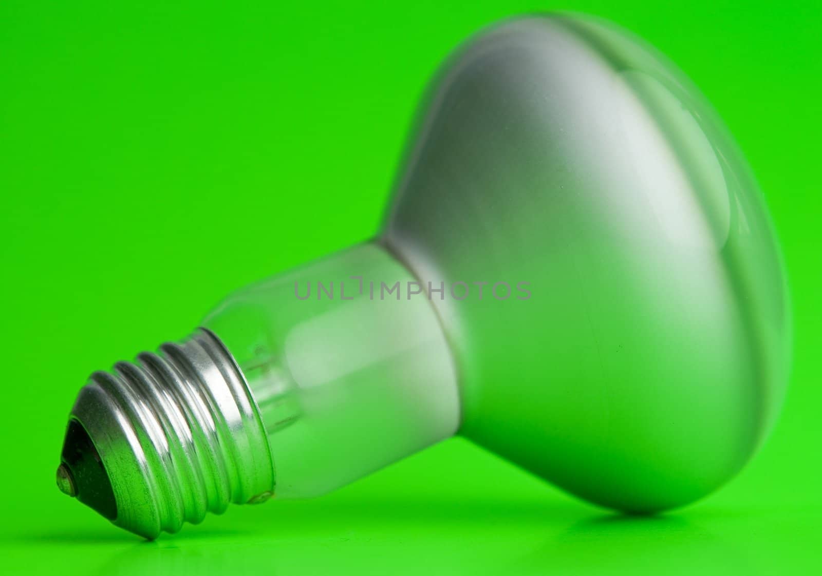 the electric bulb on a green background