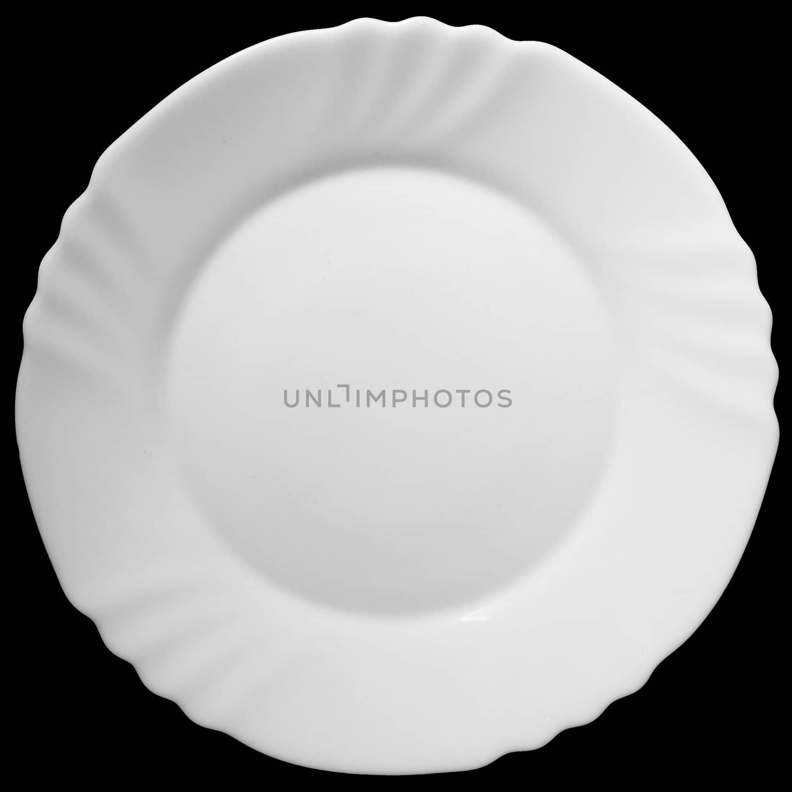 the white plate on a black background