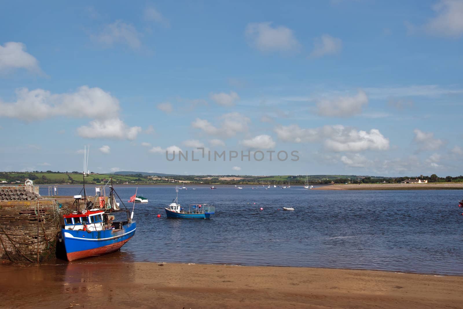 fishing boat on a dock in youghal harbor ireland