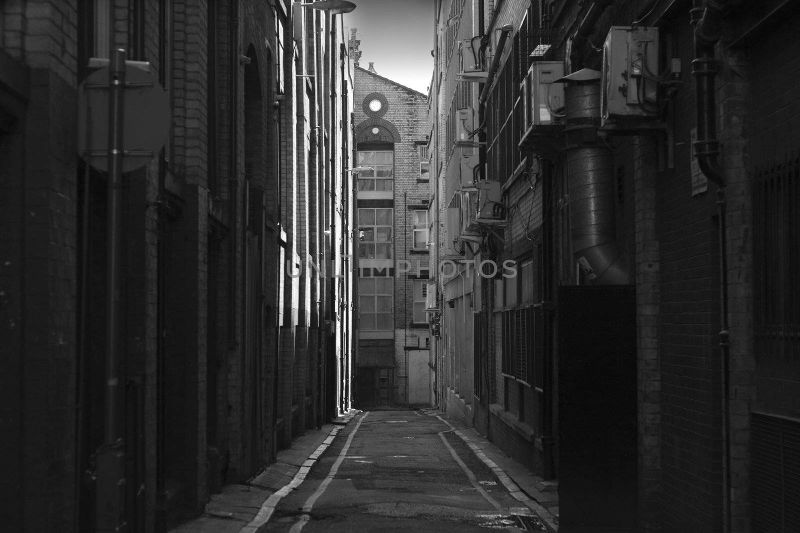 Looking down a long dark back alley by illu