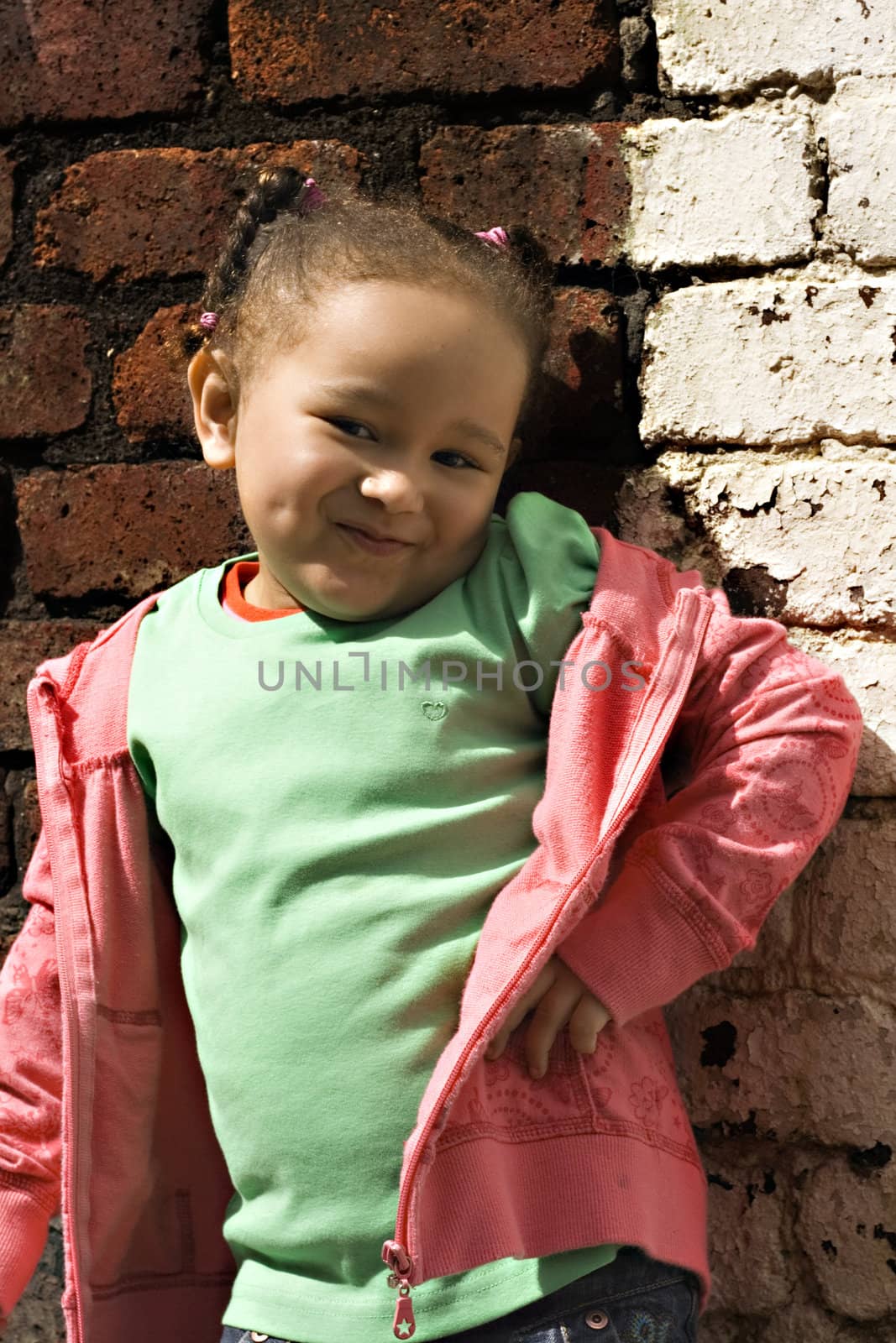 Young black baby girl playing in an alley by illu