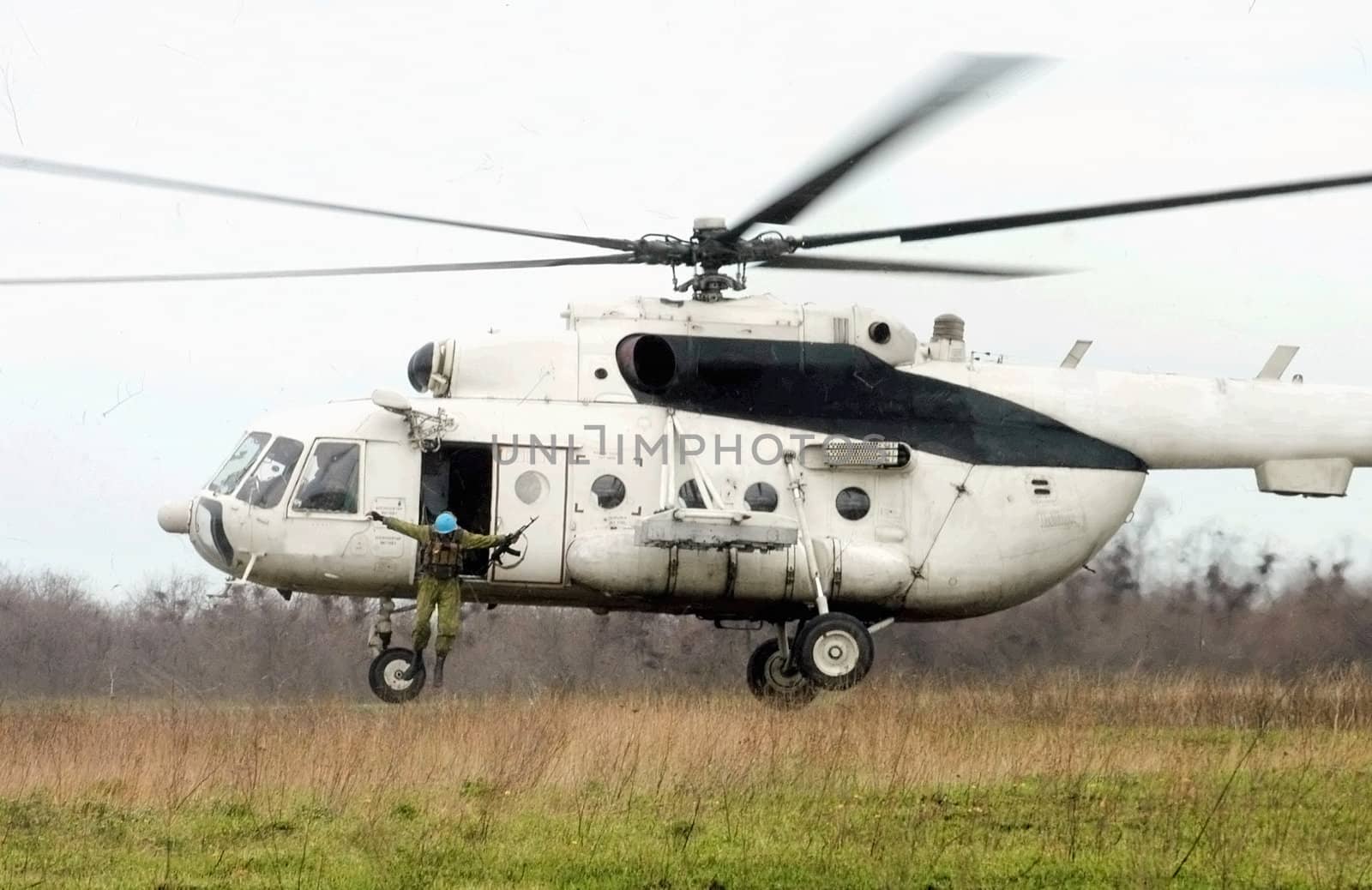 paratroopers  jump from helicopter 