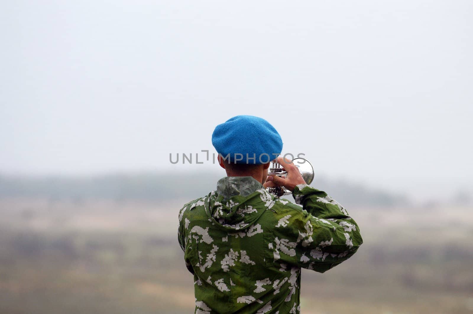 a trumpeter plays before the beginning of soldiery studies                        