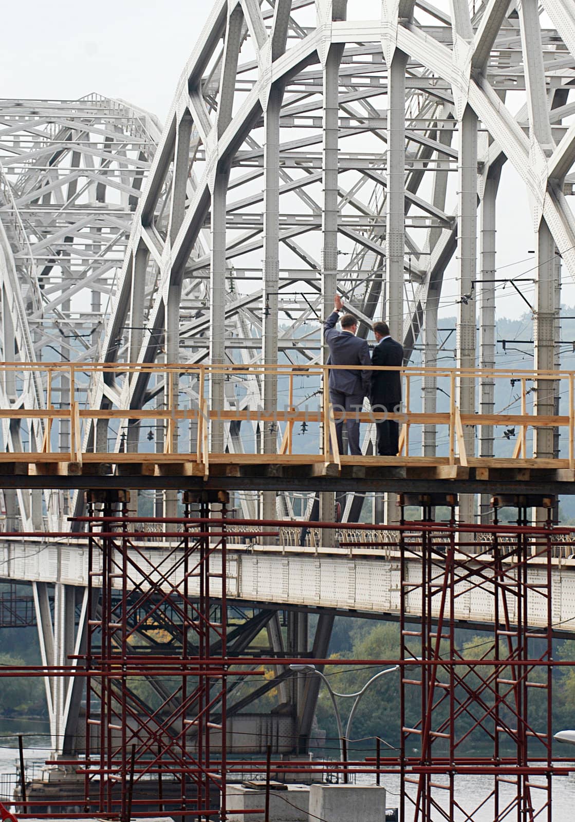 two businessman on the bridge by joyfull