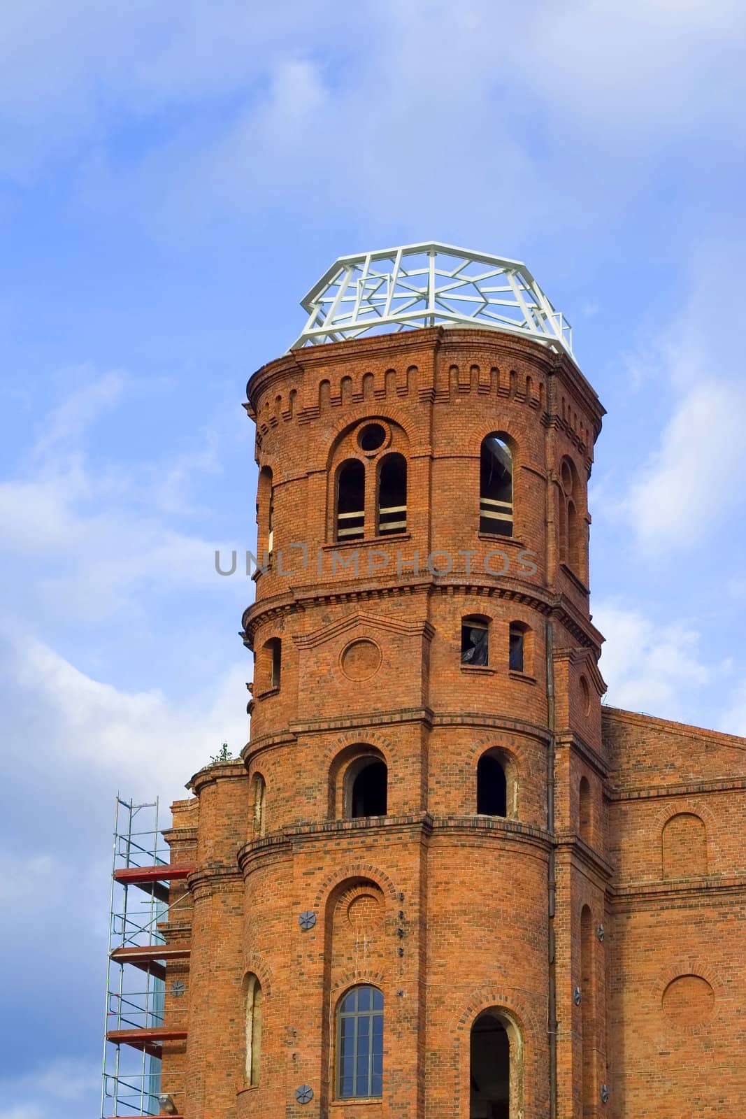 Old gray and weatherbeaten smelting industry factory