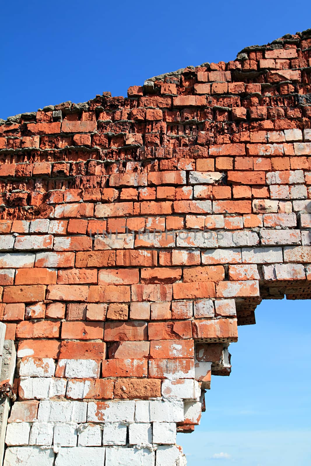 aging brick wall on celestial background