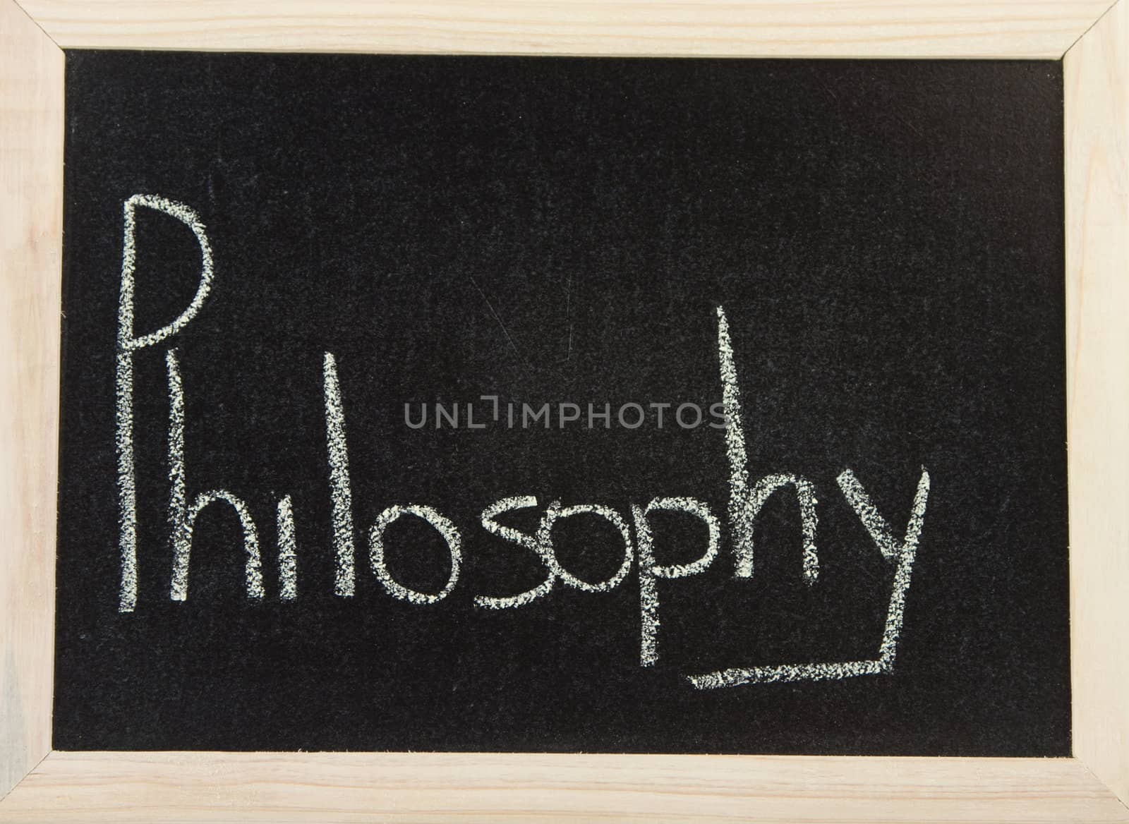 A black board with a wooden frame and the words 'PHILOSOPHY' written in chalk.