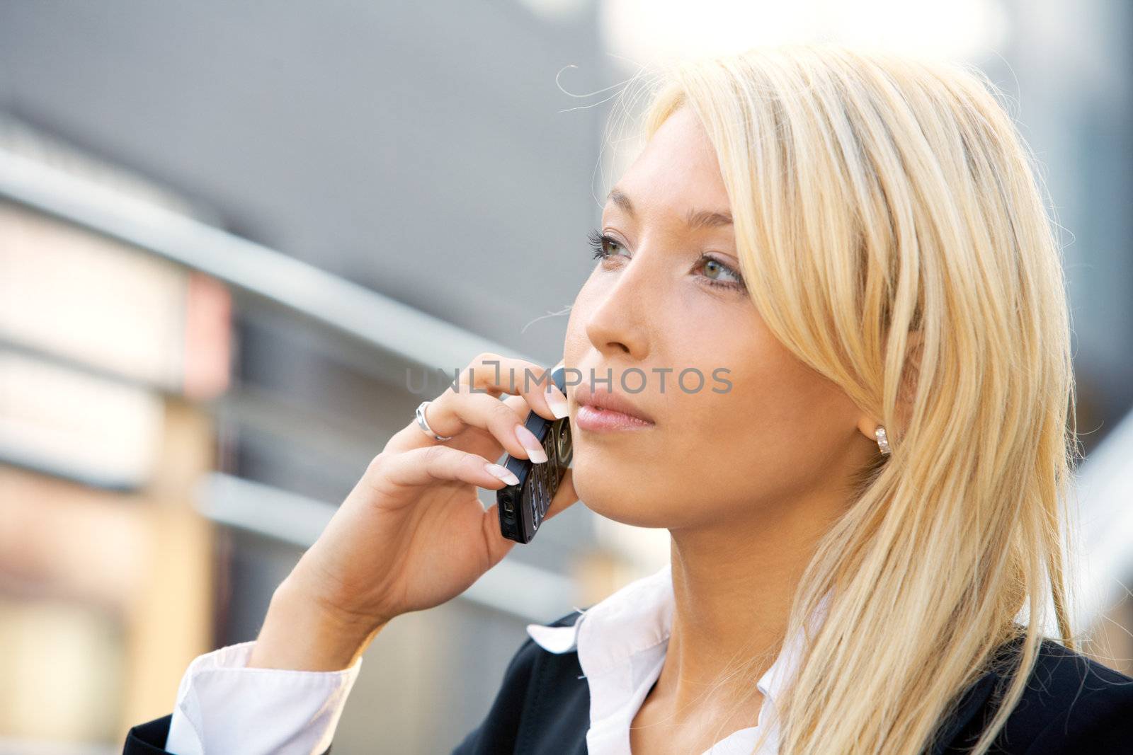 Businesswoman With Cell Phone by Luminis