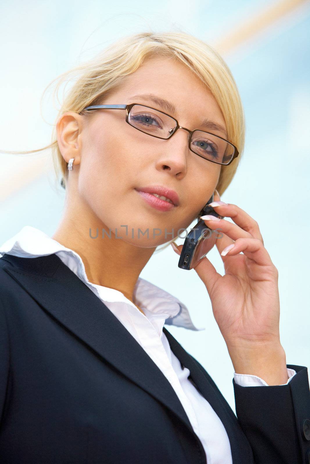 Young Businesswoman On Phone by Luminis