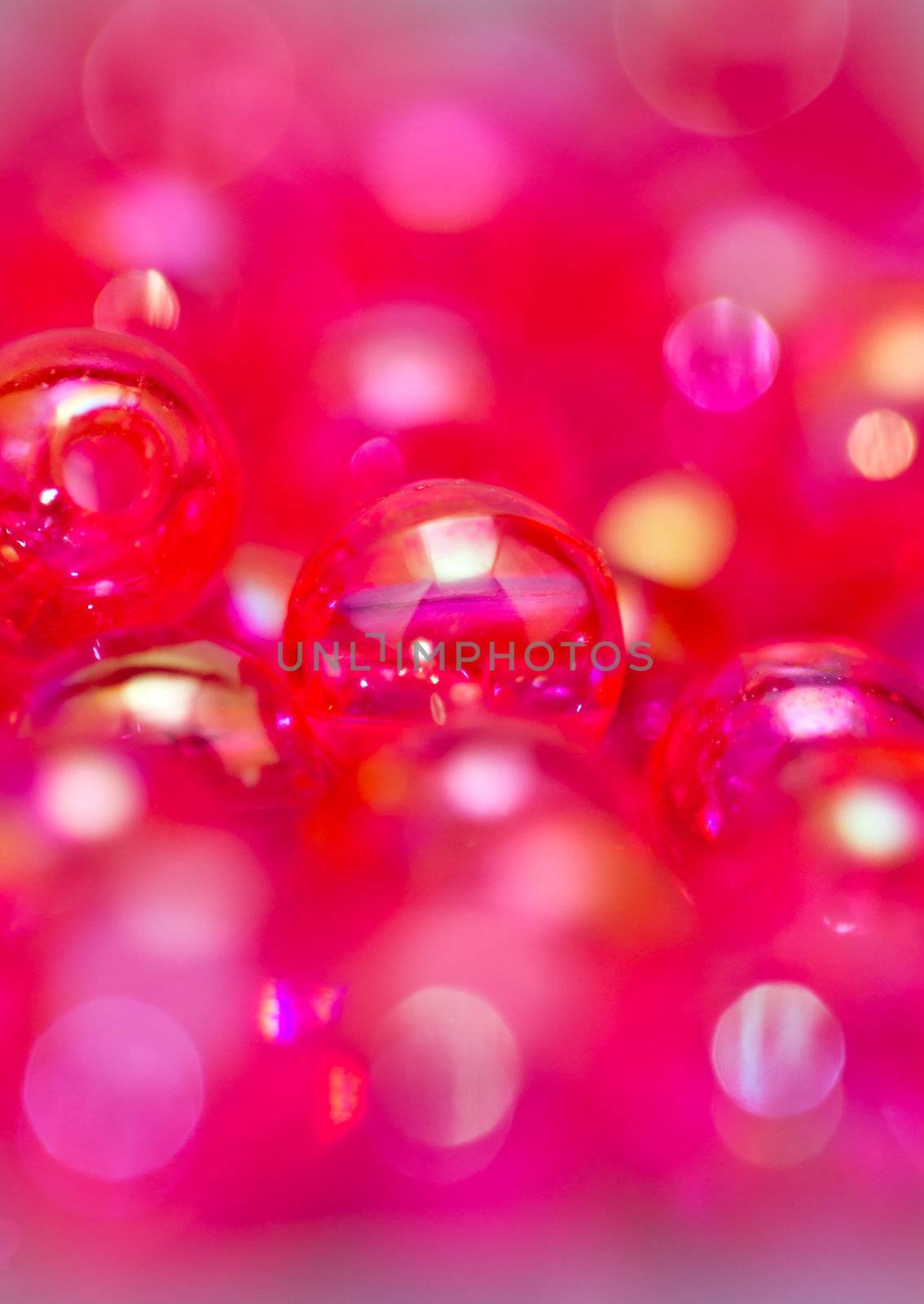 red beads abstract background in close up view portrait orientation