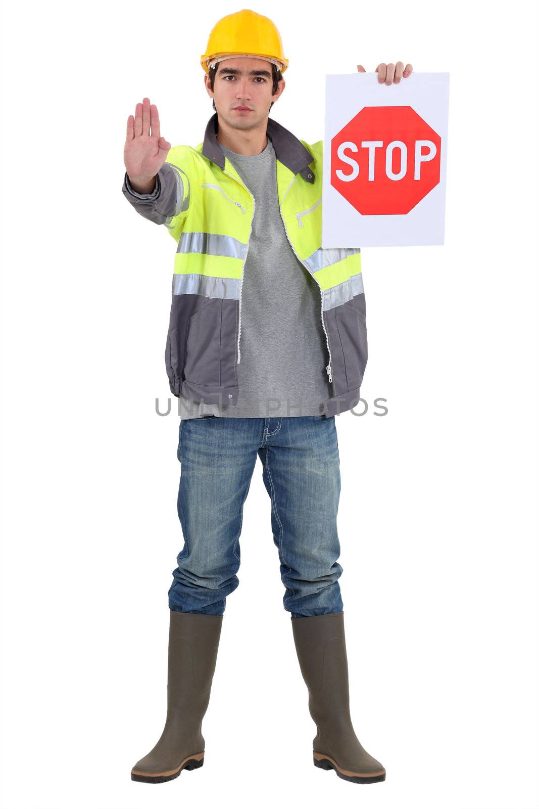 Traffic guard directing traffic by phovoir