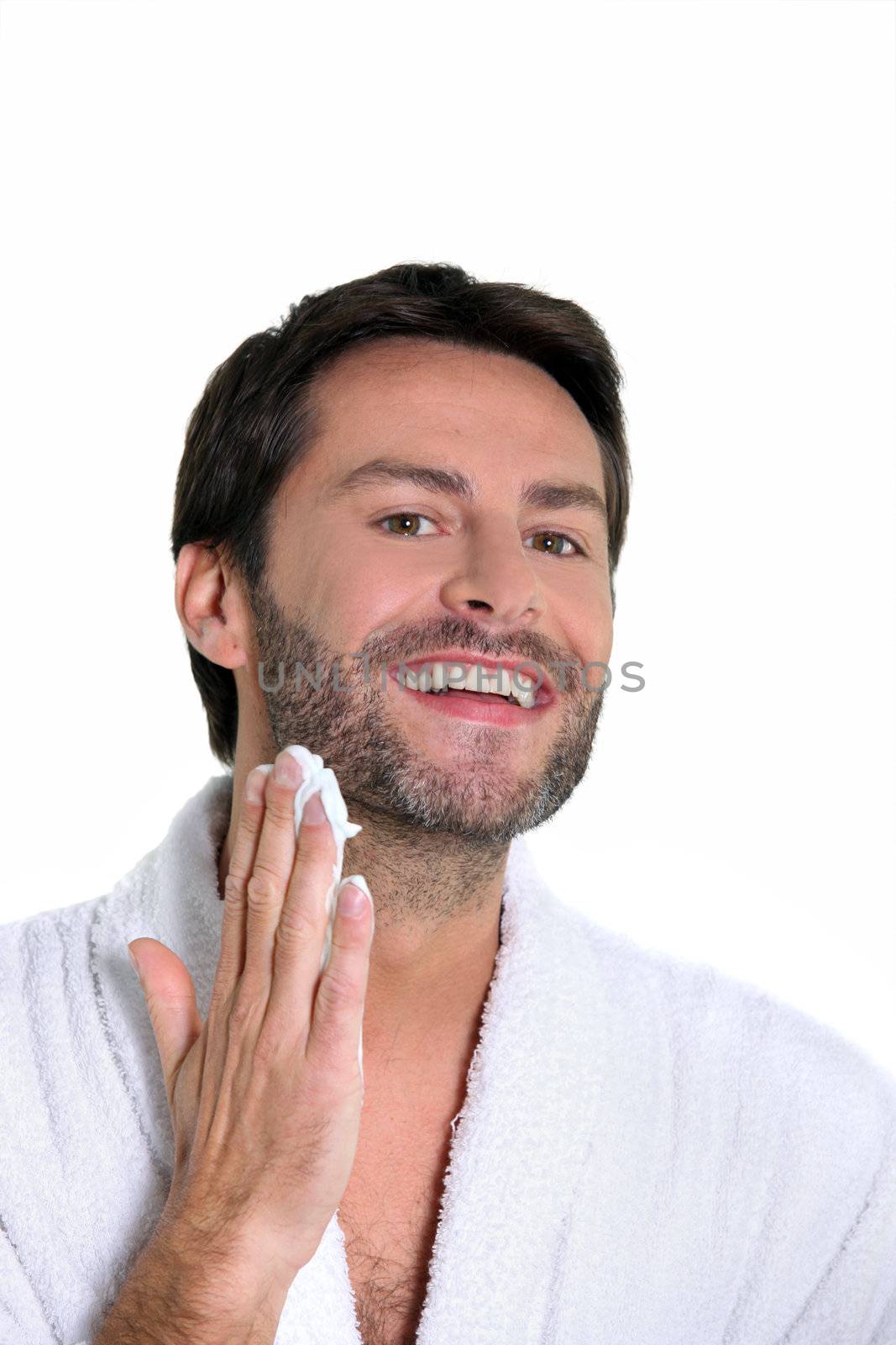 30 years old man shaving off his beard