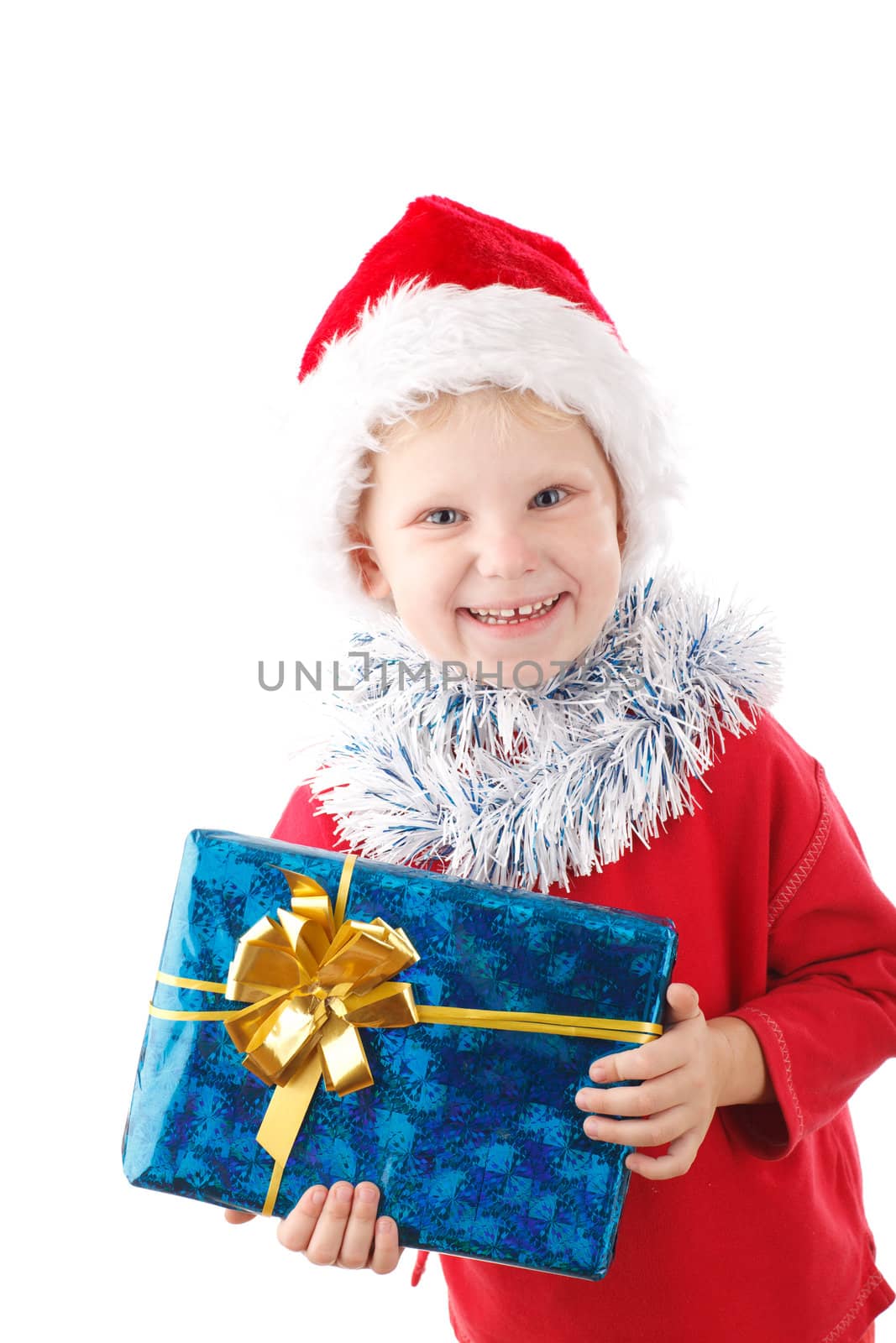 child in Santas cap with present