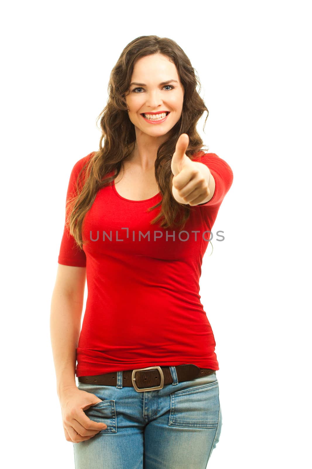 Beautiful young woman wearing a bright red top giving thumbs up