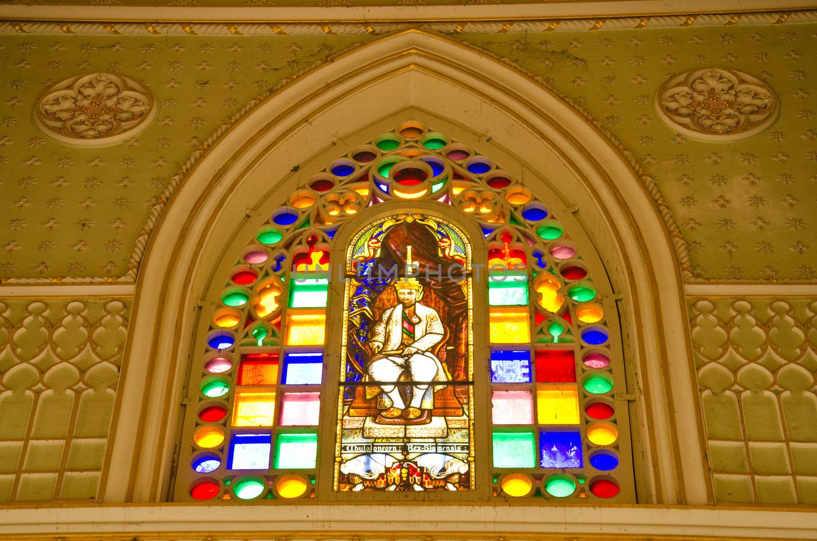 Decorated with stained glass windows.