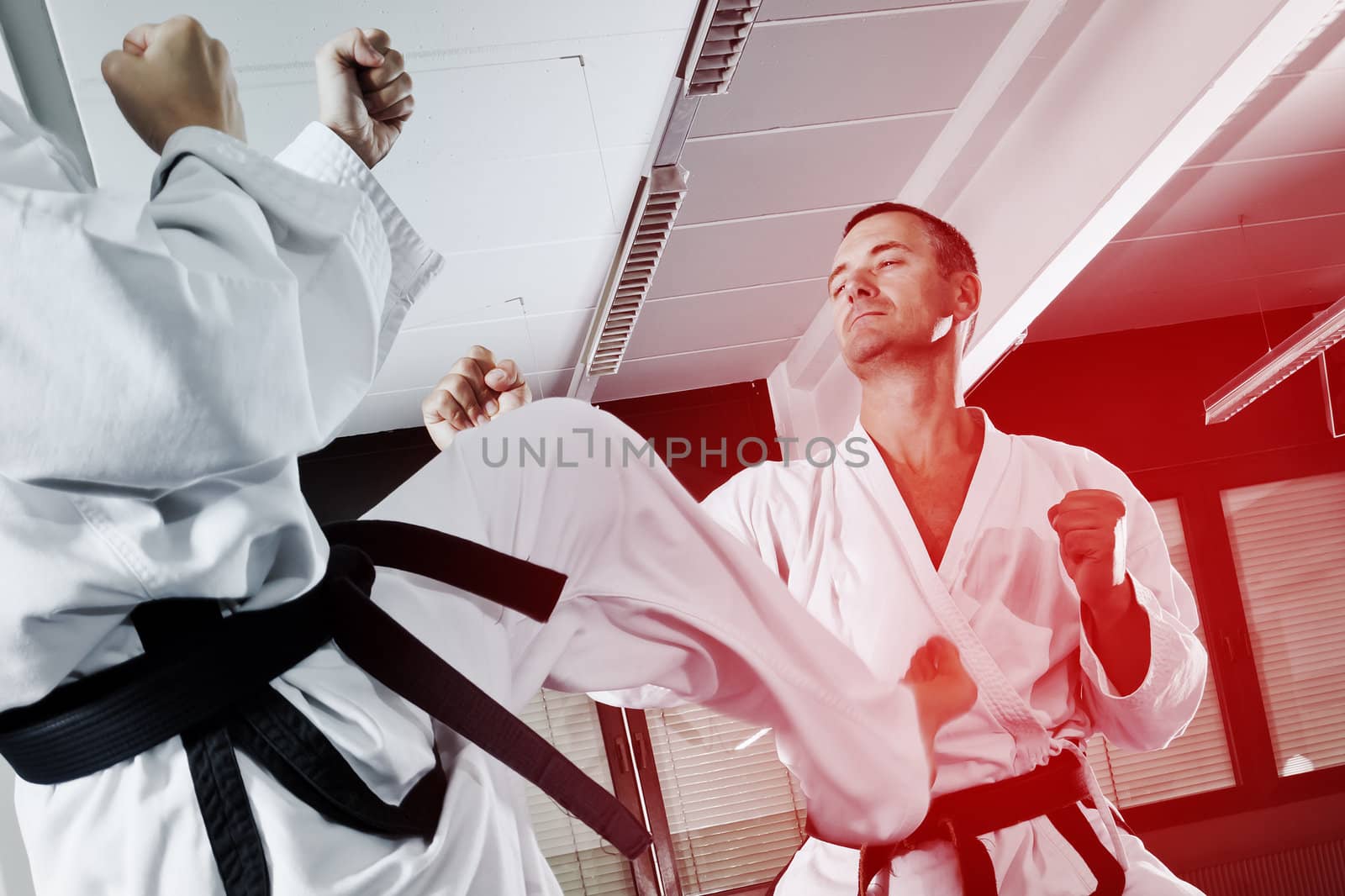 An image of two martial arts masters fighting