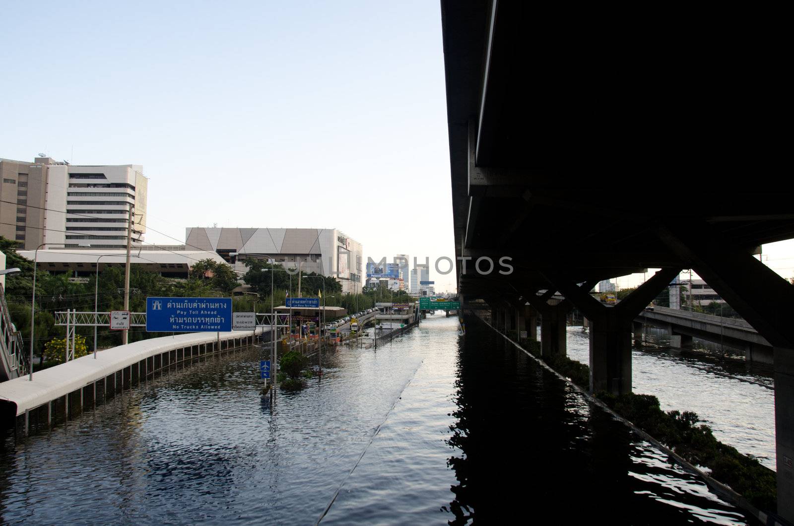 BANGKOK THAILAND – NOVEMBER 13: Scenes The Siam Commercial Bank, Limited  in Bangkok during its worst flooding in decades is a major disaster on November 13, 2011  in Bangkok, Thailand.