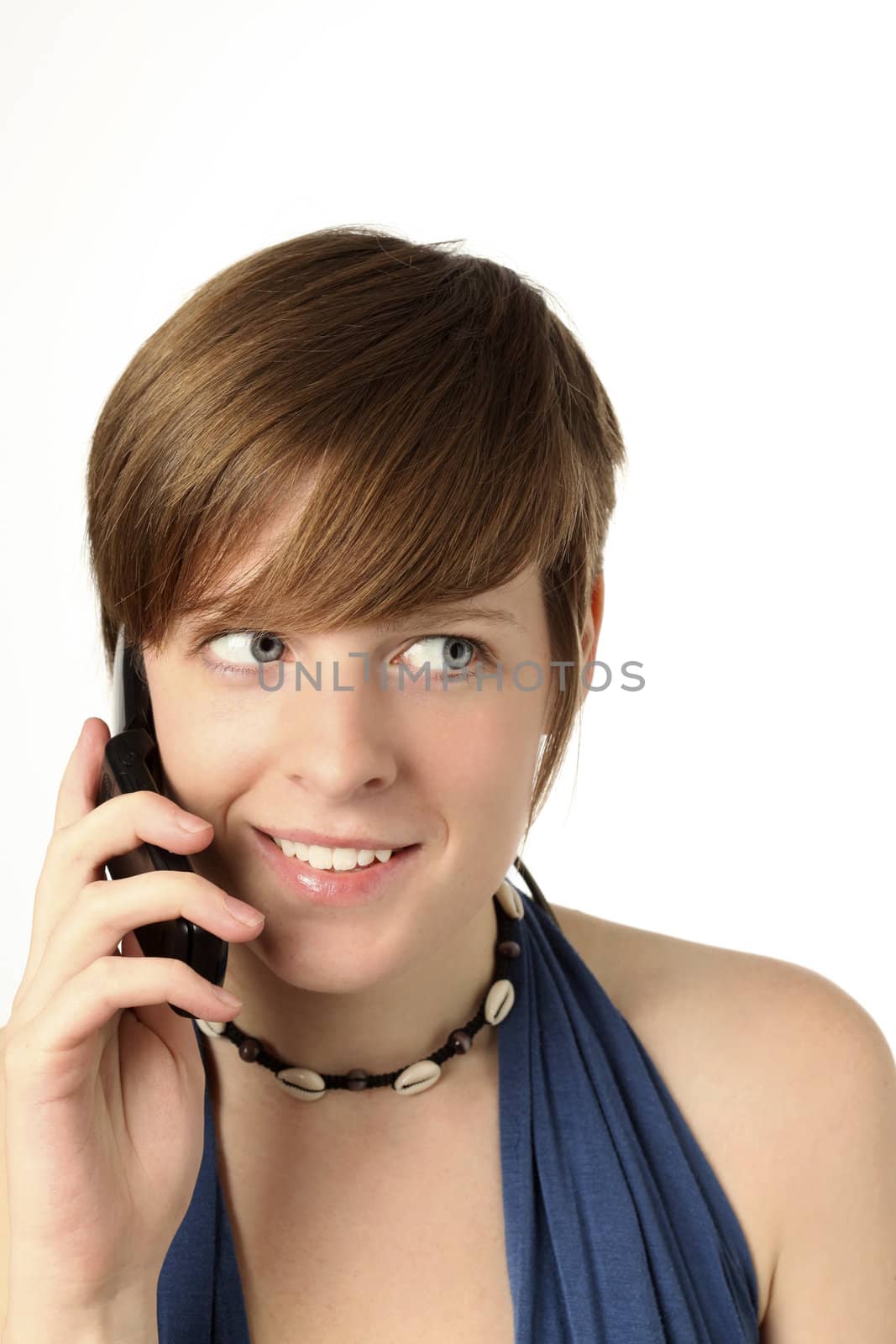 young woman with cell phone listening