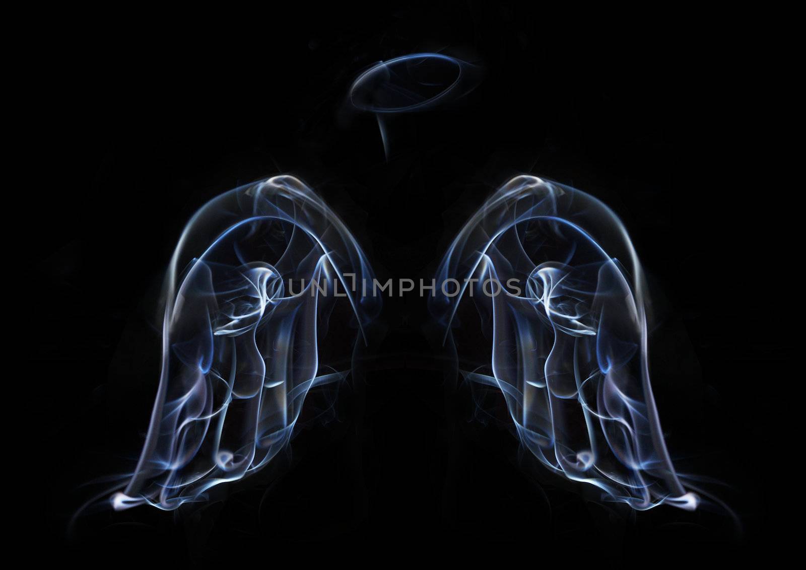 The two wings of angels, and a halo of smoke on a black background