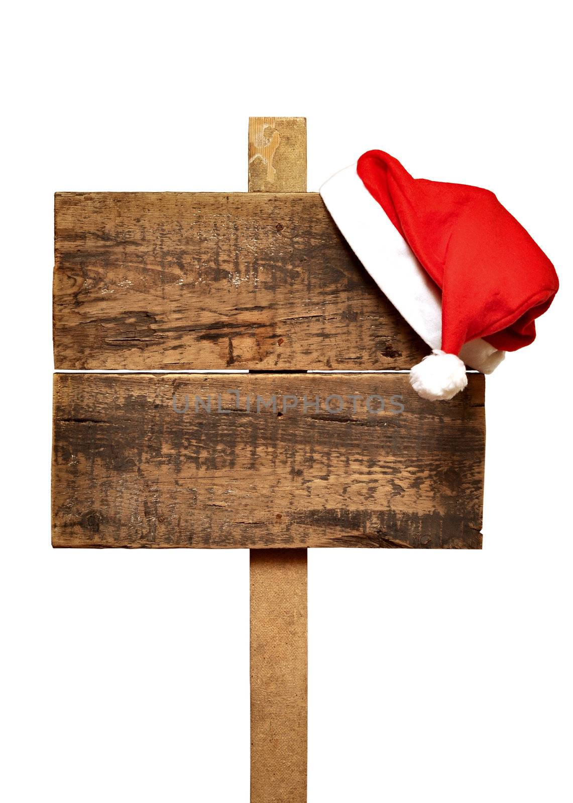 wooden road sign with Santa's hat  isolated on a white background 