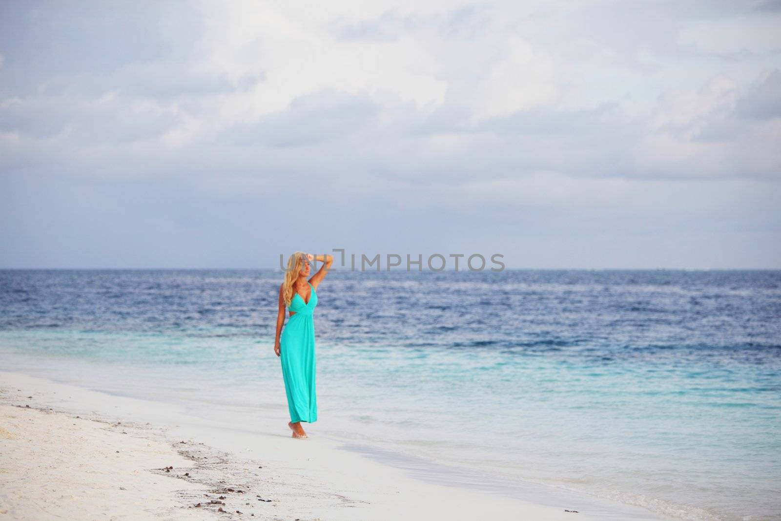 woman on the ocean coast by Yellowj