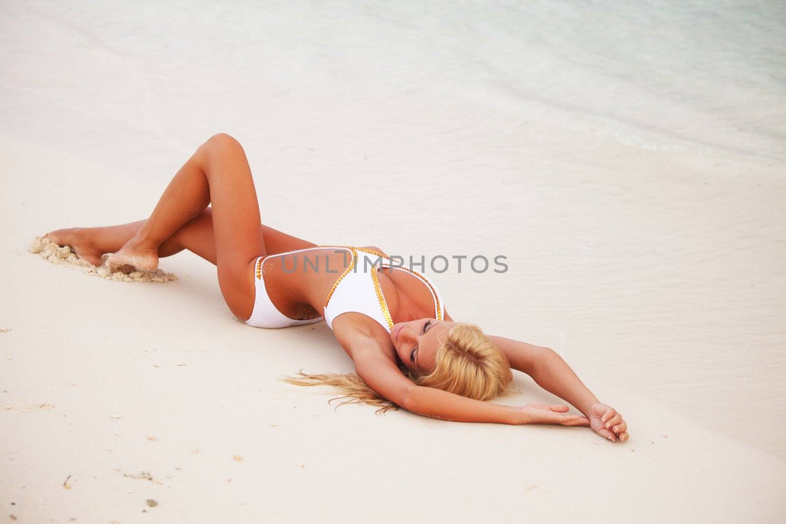 woman on the sand the ocean coast by Yellowj