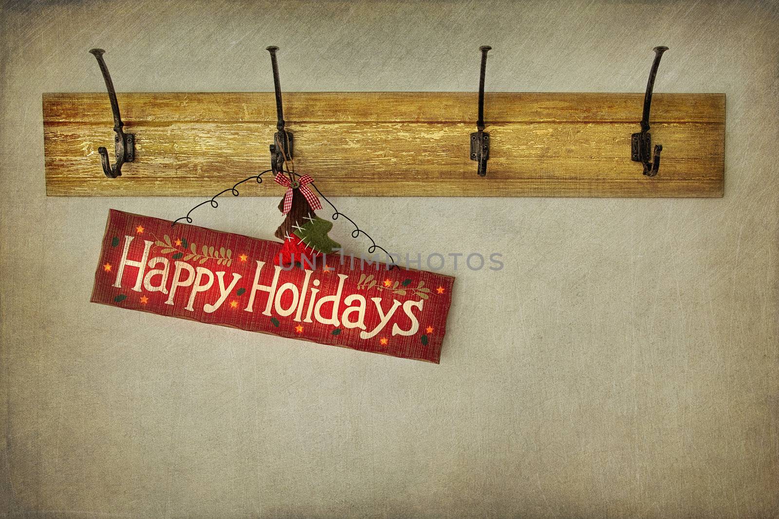 Holiday sign on antique plaster wall by Sandralise