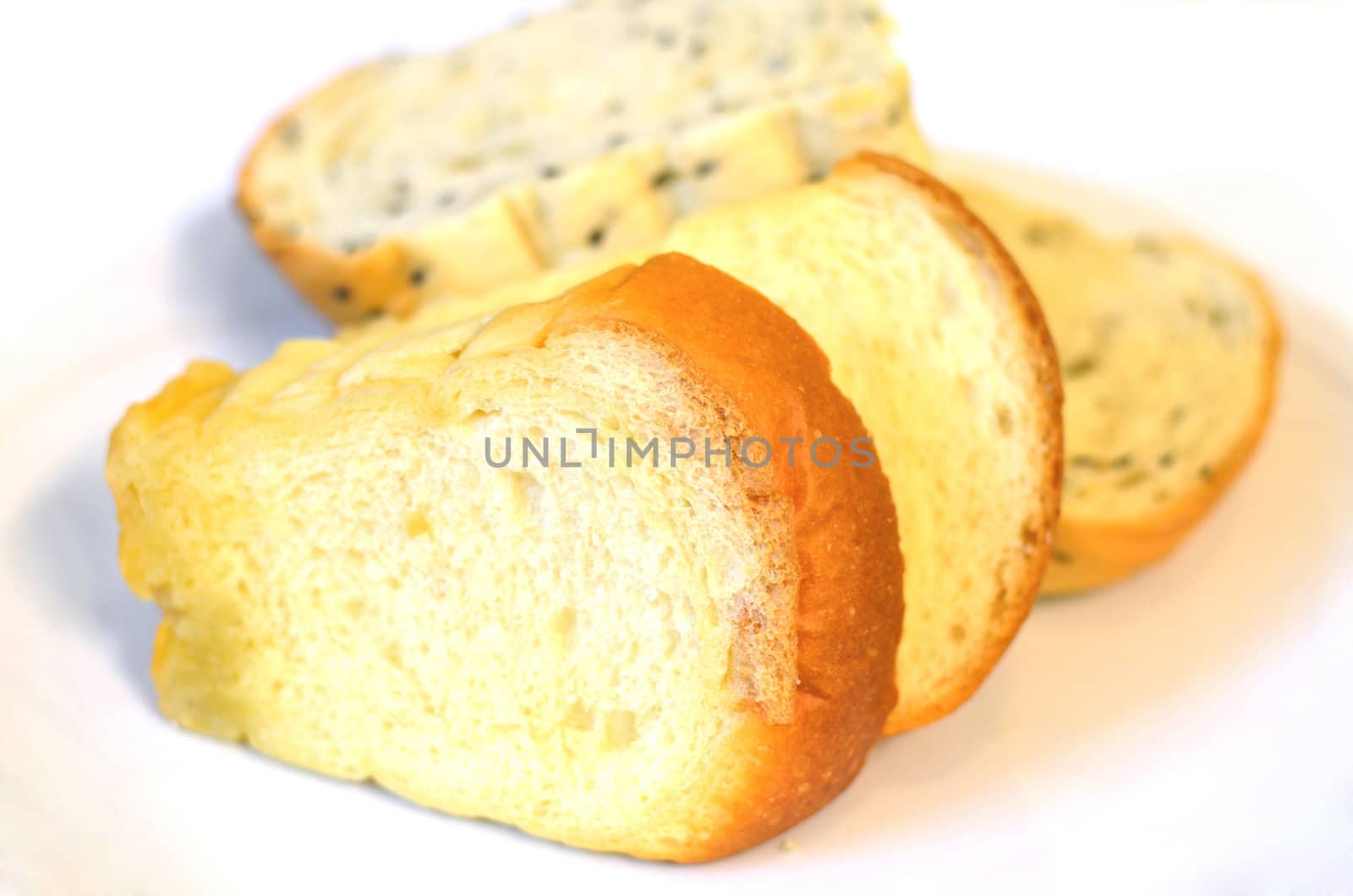 Butter cake  slices and bread with sesame