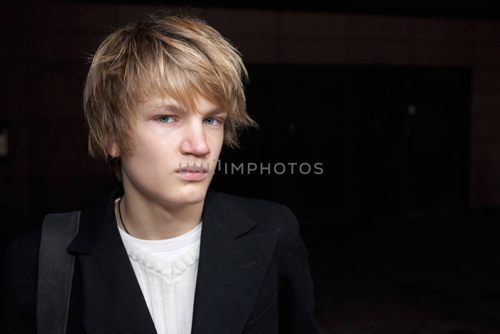 Portrait of teenage boy looking at camera