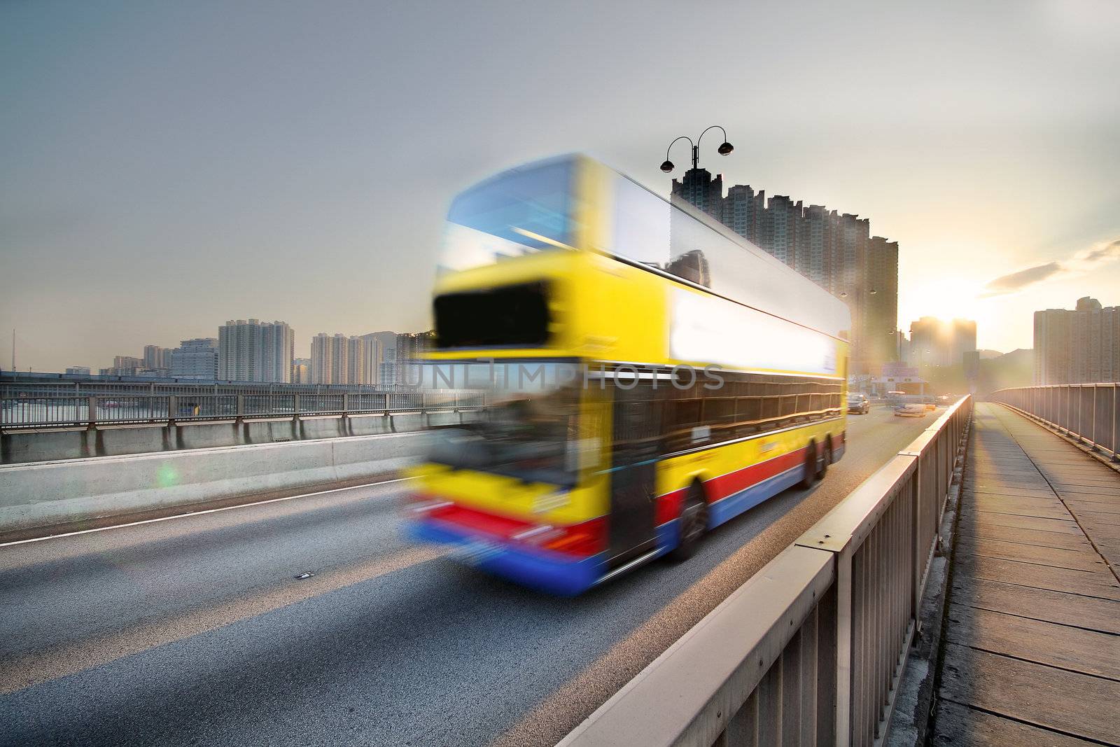 speed bus through sunset road