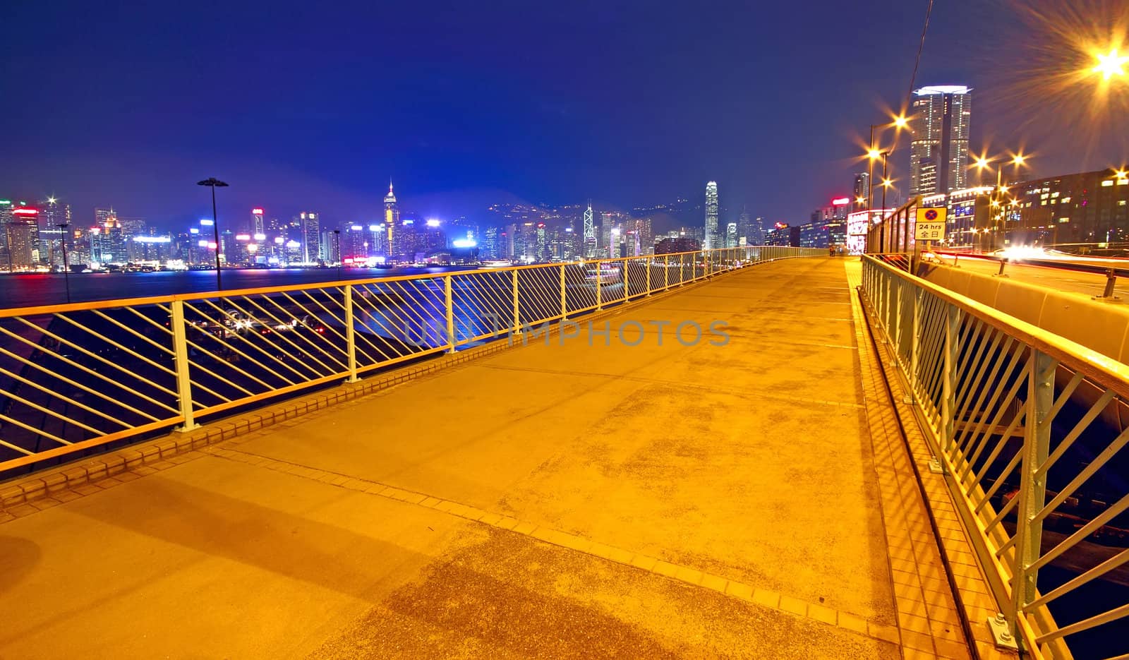 pedestrian overpass and traffic bridge at night