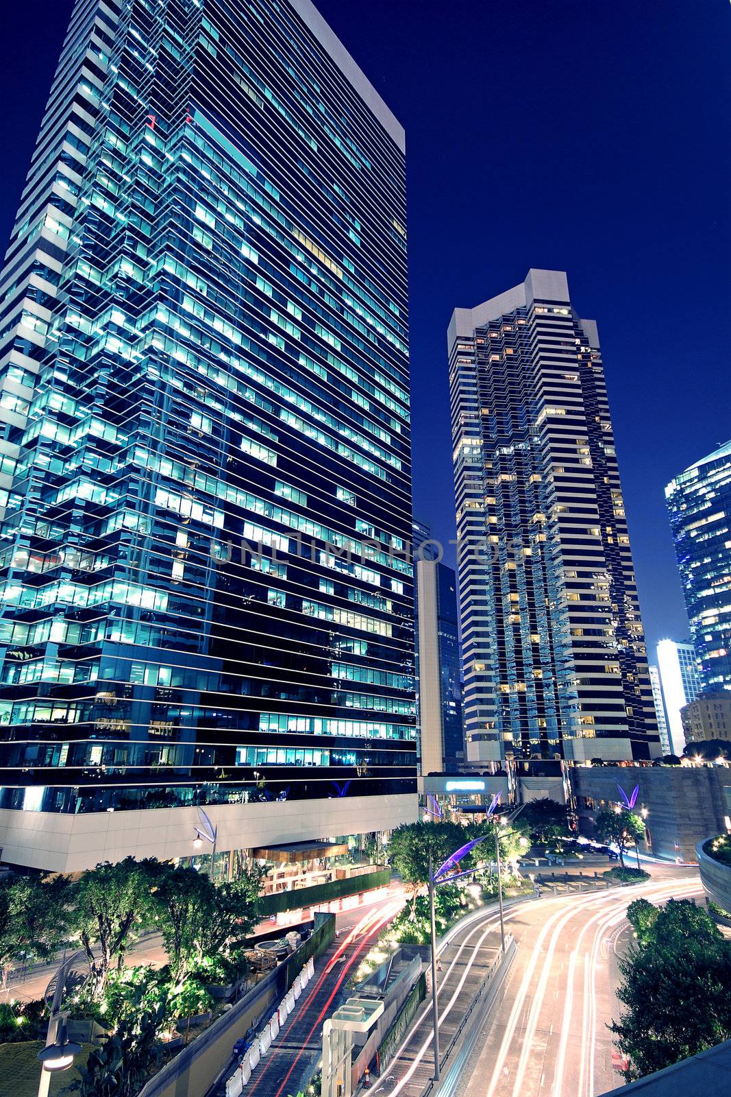 Tall office buildings by night 