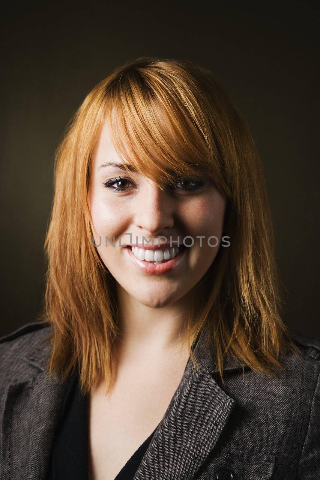 Portrait of smiling woman by iofoto