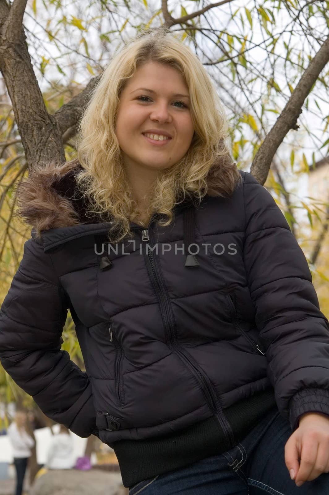 Young woman in a autumn park