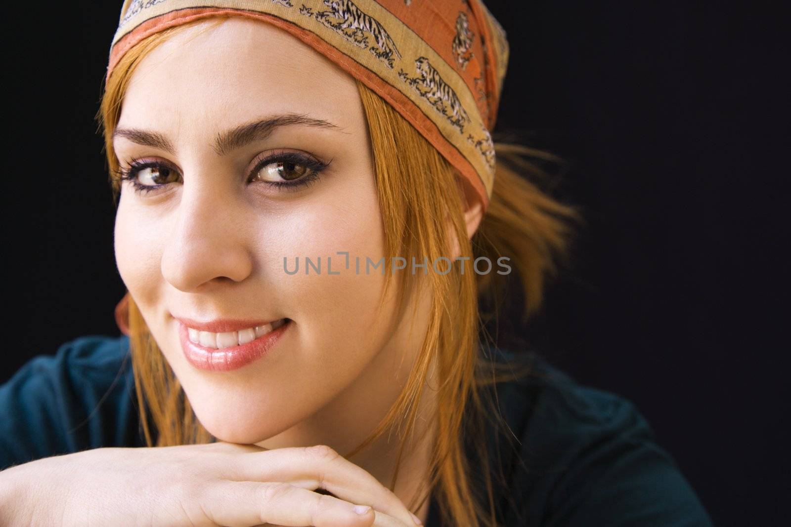 Smiling woman in cap by iofoto