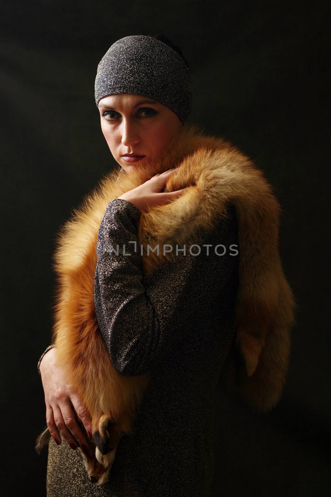 The beautiful woman in a collar from the fox fur