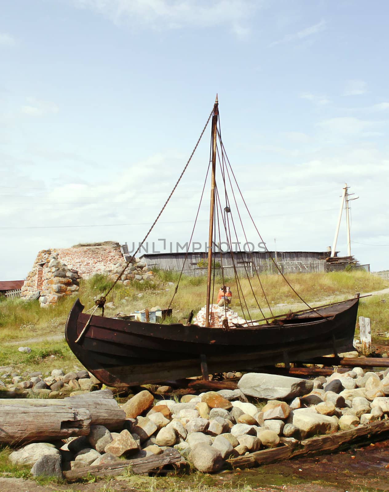 Old sailing boat ashore