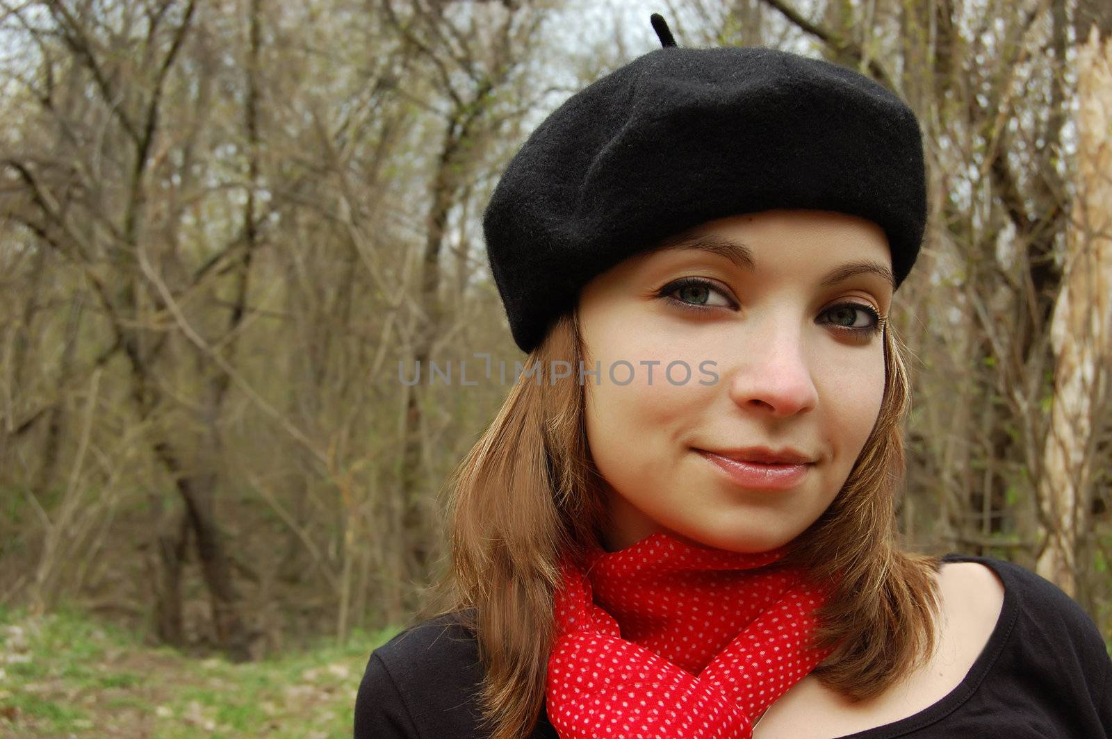 elegant girl in beret on nature nackground