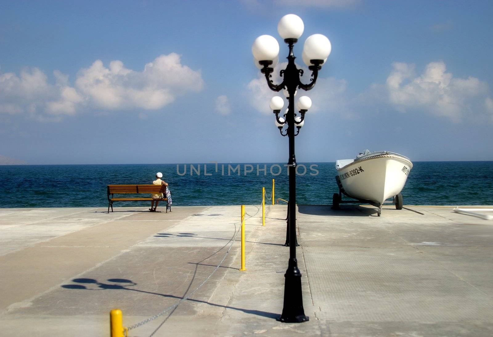 The woman looking at the sea