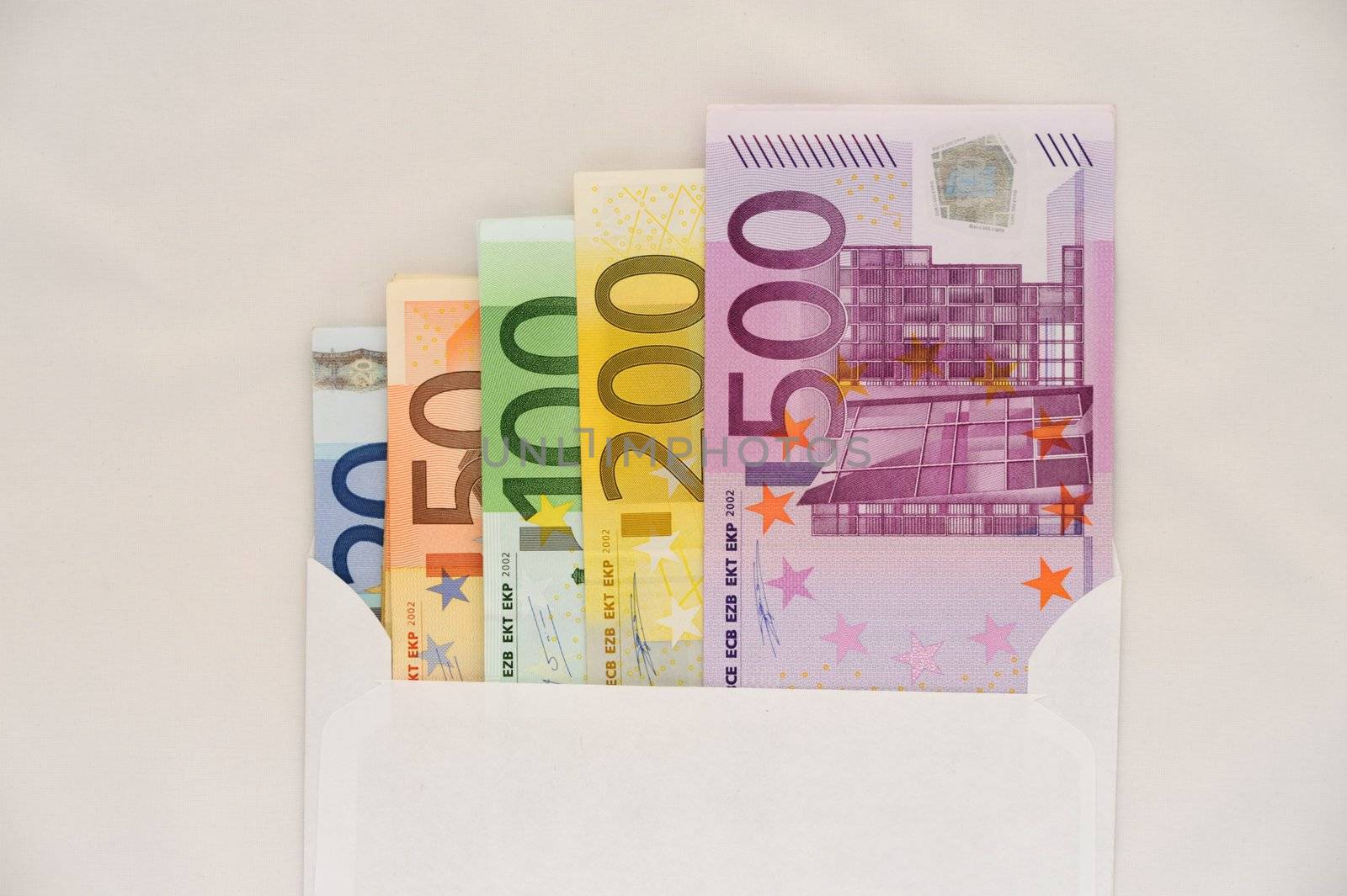 Euro in White Envelope On a White Background.
Concept of a Riches.