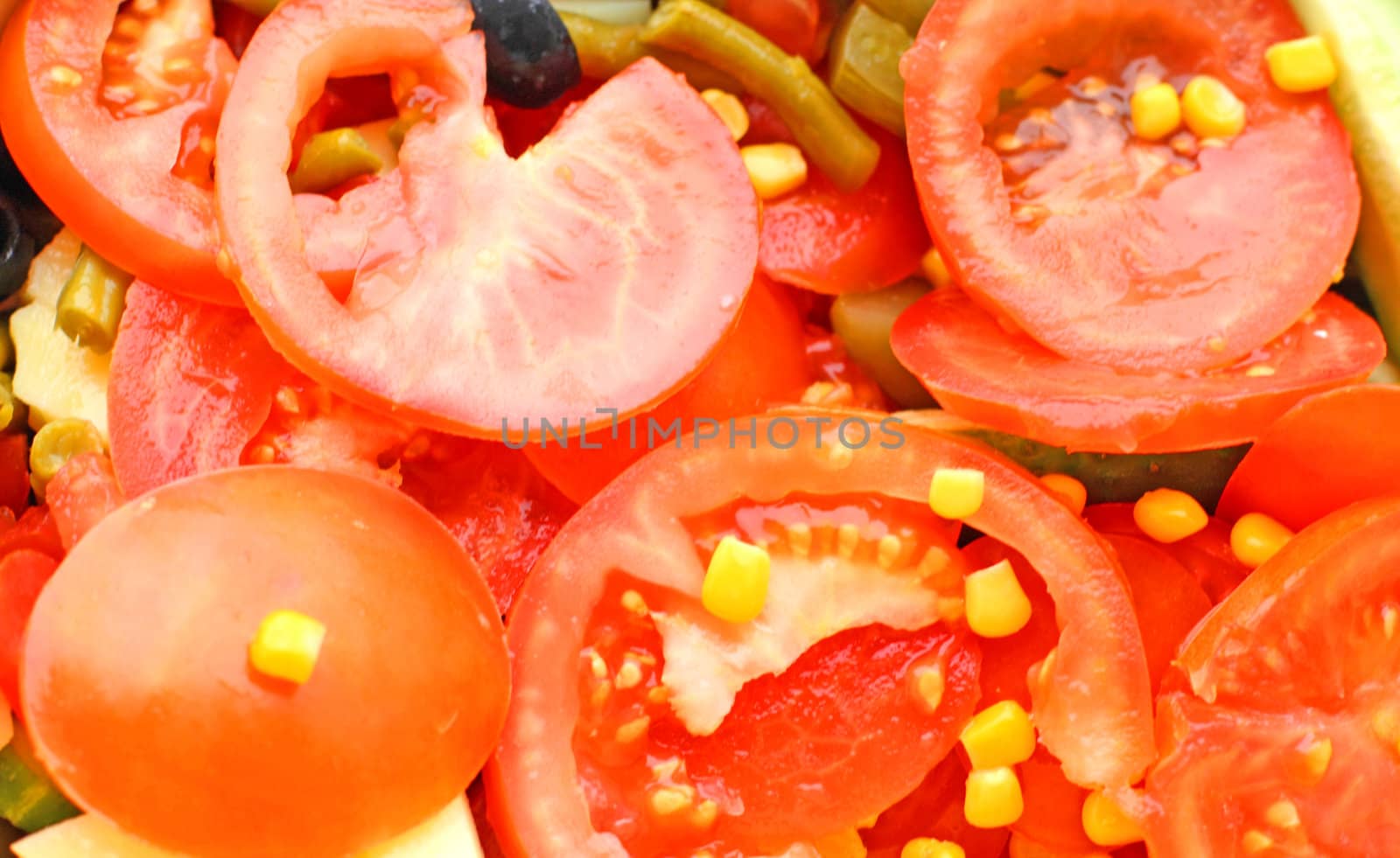 Close up of the ripe mixed vegetables in salad