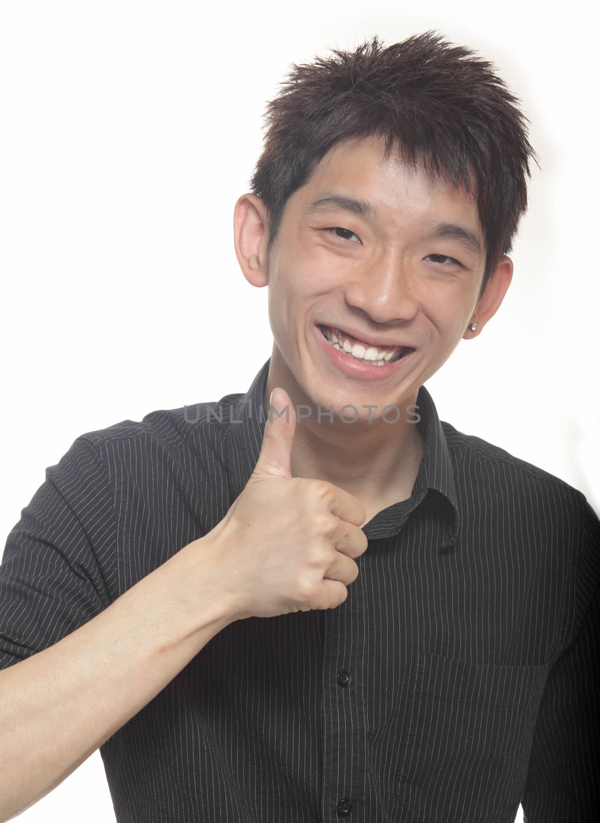 Portrait of hand showing goodluck sign against white background  by cozyta